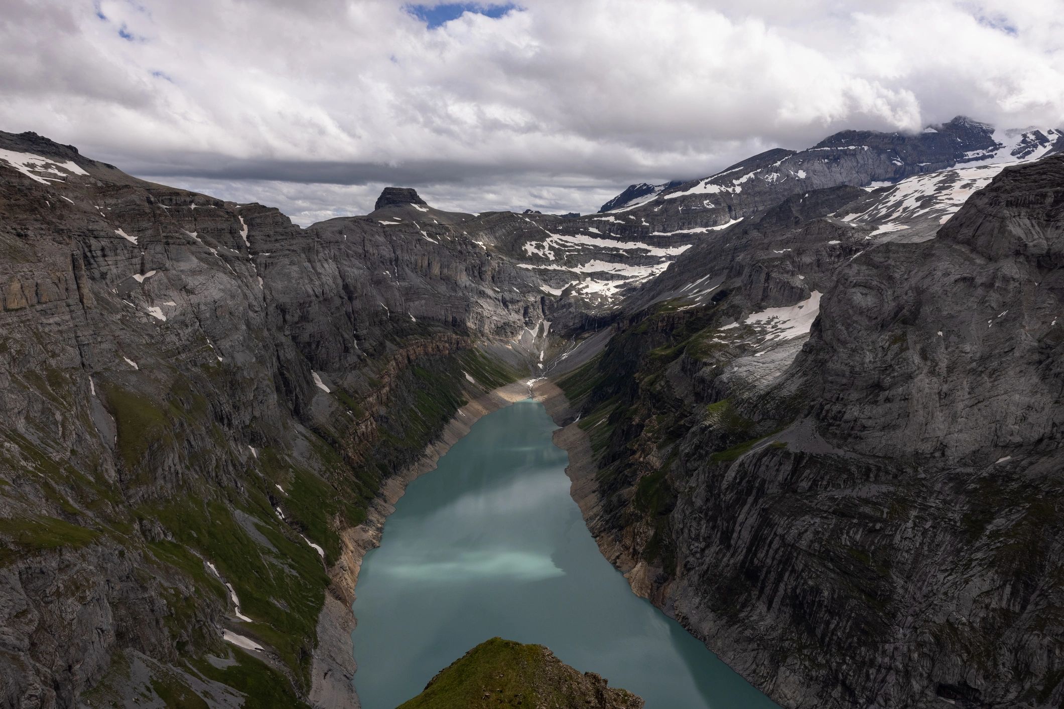 Swiss alpine trail and lake symbolizing disciplined governance