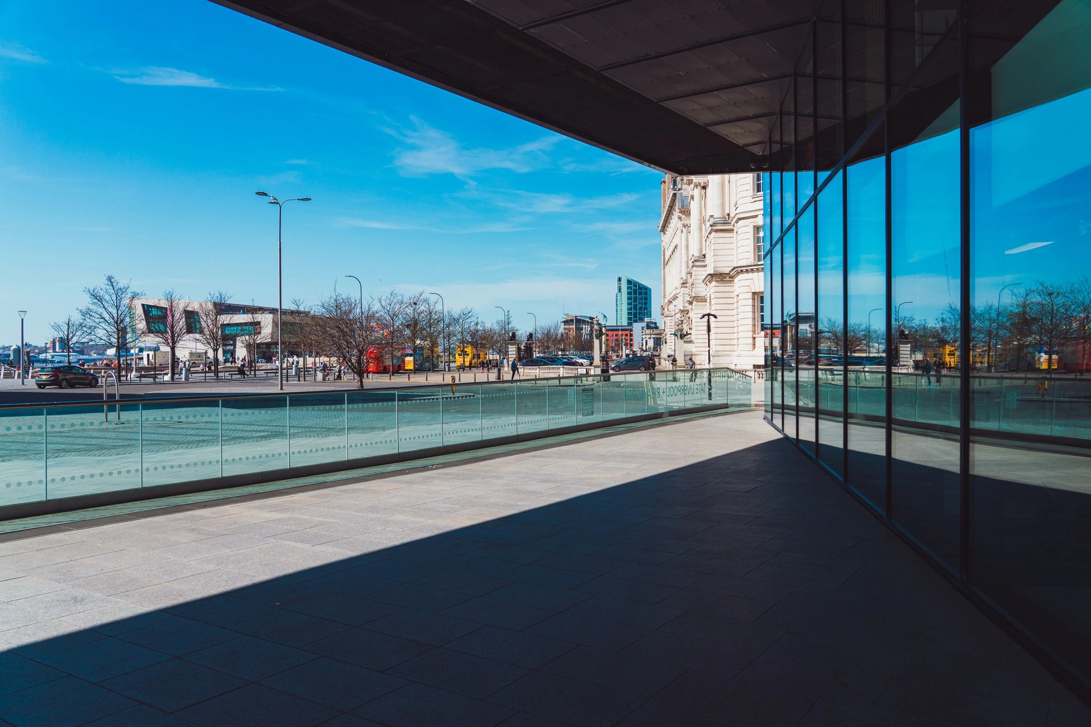Refined architectural facade with modern glass reflections and no visible people